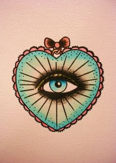 an eye is in the middle of a heart