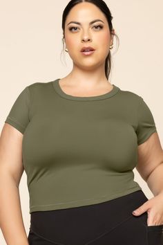 Designed for casual, here for play. Meet the 90’s-inspired baby tee designed to seamlessly move with your body no matter how laid back (or intense) your movement gets. Basic Scoop Neck Gym Top, Basic Gym Top With Scoop Neck, Sporty Green Scoop Neck Top, Green Scoop Neck Athleisure Top, Green Scoop Neck Top Athleisure Style, Green Scoop Neck Sports Top, Trendy Scoop Neck Sports Top, Green Scoop Neck Top For Gym, Trendy Scoop Neck Gym Tops