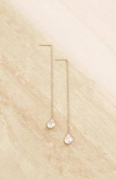 Teardrop-shaped cubic zirconia bring sparkle to these 18-karat gold-plated threader earrings with dainty dimension. 3 1/4" drop; 3/8" width Thread-through style 18k-gold plate/cubic zirconia Imported Different Ear Piercings, Bridesmaid Looks, String Earrings, Sunset Quotes Instagram, Opal Drop Earrings, Threader Earrings Gold, Bridesmaid Earrings Gold, Beads Craft Jewelry, Gold Earrings Wedding