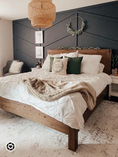 Christmas bedroom with green linen cushion covers, Merry Christmas pillow and a neutral area rug with a wood bed frame. Brown Wood Bed Frame, Wood Headboard Bedroom, Craft Spaces