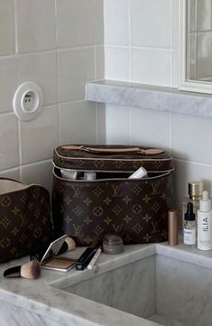 Vanity Organizing Ideas, Lv Vanity Bag, Louis Vuitton Makeup Bag, Louis Vuitton Vanity, Louis Vuitton Makeup, Luxury Travel Bags, Mocha Girls, Vanity Inspiration, Makeup Collection Goals