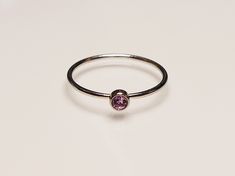 Looking for a dainty and stackable June birth stone ring? This ring is the perfect best friend gift, gift for your sister, or dainty jewelry for your bridesmaids to wear on your wedding day, pick any one of our 12 birthstone choices! Product Details: Materials: Stainless Steel Color: Silver Stone Color: Purple Band Size: 1mm Stone Size: 3mm You will receive one June birthstone ring. June Birthstone Ring, Gifts For Your Sister, Purple Band, June Birthstone, Best Friend Gift, June Birth Stone, Dainty Jewelry, Birthstone Ring, On Your Wedding Day