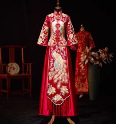 Looking a traditional Chinese bridal gown. This beautiful 2-piece qun kwa set is embroidered with gold, silver,blue and white threads. The intricate flower and peacock embroideries are decorated throughout the jacket and skirt. The peacock is a manifestation of the heavenly phoenix on earth, divinity, beauty, power, rank, and beauty. It's a perfect option for your traditional Chinese wedding, tea ceremony. Size Guide: Please refer to the size guide picture before placing the order. Please leave Traditional Wedding Gown With Traditional Patterns, Ceremonial Embroidered Dress With Traditional Drape, Traditional Ceremony Gown For Festivals, Traditional Embroidered Dress With Traditional Patterns For Wedding, Traditional Embroidered Dress For Wedding With Traditional Patterns, Traditional Embroidered Dress With Patterns For Wedding, Traditional Wedding Dress For Ceremonies, Traditional Embroidered Wedding Dress For Festive Season, Floor-length Sets With Floral Embroidery For Ceremony