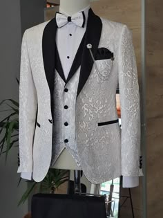 Suit Material: 65% viscose, 35% polyester Machine Washable: No Fitting: Slim-Fit Cutting: Double Slits, One Button Package Include: Suit Clothes: Jacket, Vest and Pants Gifts: Shirt, Bow Tie and Chain Shawl Lapel Tuxedo, Tuxedo Colors, Costum Elegant, Pants Gift, Wedding Suits Groom, Groom Tuxedo, White Tuxedo, Bespoke Suit, Prom Suits