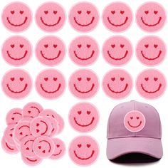 a baseball cap and patches with smiley faces on them