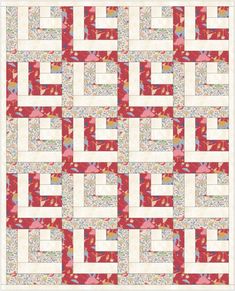 a red and white quilt with an intricate design on the center, in different colors