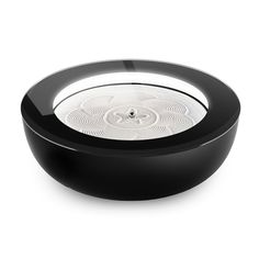 a black and white circular object on a white background