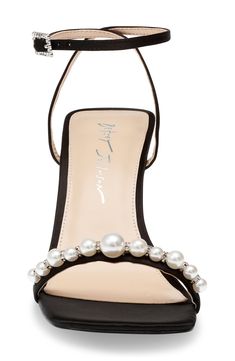 Pearly beads and dazzling embellishments lend timeless glamour to a luxe satin sandal fashioned with an angular square toe for contemporary appeal. 3 1/2" heel Adjustable ankle strap with buckle closure Cushioned footbed Synthetic upper, lining and sole Imported Elegant Holiday Sandals With Ankle Strap, Elegant Ankle Strap Sandals For Holiday, Pearl-embellished Open Toe Sandals For Evening, Pearl Embellished Open Toe Evening Sandals, Pearl Embellished Open Toe Sandals For Evening, Elegant Synthetic Sandals For Holidays, Elegant Evening Sandals In Synthetic Material, Elegant Evening Sandals With Synthetic Material, Elegant Sandals For Holiday Events