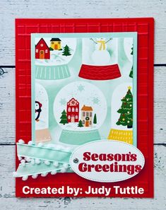 a card with the words seasons greetings on it