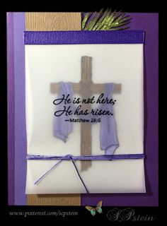 a card with a cross and the words he is not here