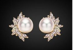 pair of pearl and crystal earrings