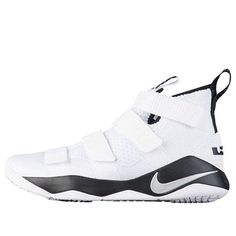 the nike zoom basketball shoe is white and has black accents on the upper half of the shoe