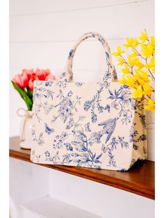 Blue and White Bird and Floral Tote - Lolo Viv Boutique Spring Vacation Canvas Shoulder Bag, Chic Blue Cotton Bag, Spring Vacation Cotton Shoulder Bag, Casual Bags With Canvas Lining For Spring, Spring Vacation Canvas Bag, Blue Floral Print Shoulder Bag For Spring, Spring Travel Canvas Bag, Casual Blue Shoulder Bag With Floral Print, Blue Canvas Bag For Everyday Use In Spring