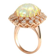 Stamped: 14K Rose GoldTotal Ring Weight: 10.0 GramsRing Length: N/ARing Width: N/AGemstone Weight: Total Natural Opal Weight is 6.81 Carat (Measures: 17.15x14.67 mm)Color: MulticolorDiamond Weight: Total Natural Diamond Weight is 1.30 CaratColor: F-G, Clarity: VS2-SI1Face Measures: 26.29x23.08 mmSku: [702466W] Luxury Rose Gold Cabochon Rings, Fine Jewelry Rose Gold Ring With 17 Jewels, Formal Rose Gold Cabochon Ring, 14k Gold Rose Gold Ring With Cabochon, 14k Rose Gold Ring With Cabochon, 14k Rose Gold Cabochon Ring, Rose Gold Cabochon Ring In 14k Gold, Gold 14k Rose Gold Rings With Halo Design, Luxury Rose Gold Opal Ring