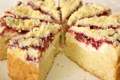 a close up of a cake on a plate with one slice cut out and ready to be eaten