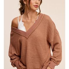 Our Lightweight Cozy Ginger Waffle Stop Is Perfect For All Seasons! Cut In An Relaxed Fit Featuring A Low V-Neckline In Front And Back, Lantern Long Sleeves With Dropped Shoulders For A Cozy Flattering Look. Added Stitch Detailing Over Raw Edges To Keep Things More Interesting And Trendy. Lightweight Waffle Texture Not Lined V-Neckline In Front And Back Elastic Cuffs And Hem Color: Ginger 98% Polyester/2% Spandex Approximate Measurements: Armpit To Armpit: S: 25", M: 26", L: 27" Length: S: 21" Cozy Ribbed V-neck Top, Chic Waffle Knit Loungewear Top, Waffle Knit V-neck Sweater For Loungewear, Waffle Knit V-neck Sweater, Spring V-neck Waffle Knit Sweater, V-neck Waffle Knit Tops For Spring, Spring Waffle Knit V-neck Top, Cozy Waffle Knit V-neck Top, Waffle Knit V-neck Tops For Layering