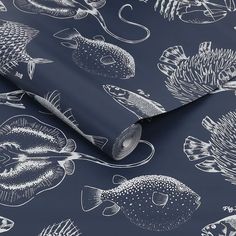 a blue wallpaper with white fish and seaweeds on the surface, as well as an ocean themed background