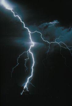 a lightning strike is seen in the sky