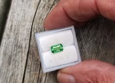 Natural fine green garnet, tsavorite  emerald cut shape for anniversary jewelry, January birthstone for custom made jewelry gift. Color: bright green   size: 7.5x4.5 mm, weight: 1.32 ct. clarity: some very minor inclusions, not noticeable origin: Tanzania All of my gemstones are at wholesale pricing.  I have been a professional gem cutter and wholesale supplier since 1992. Please visit my profile with the Better Business Bureau (you may need to copy and paste the following address to your addres Emerald Cut Green Gemstones With Accent Stones, Green Emerald Cut Gemstones For Anniversary, Emerald Cut Green Gemstones For Anniversary, Green Gemstones For May Birthstone Gift, Green Octagon Birthstone Jewelry, Green Emerald Cut Gemstones For May Birthstone, Tsavorite Gemstones For Anniversary, May Birthstone, Emerald Cut Green Gemstones For May Birthstone, Emerald Cut Tourmaline Ring Gift