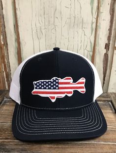 USA Bass Red/White/Blue Patch Trucker Hat AG Outfitters Exclusive Design! Richardson 112 brand hat Please send wholesale inquiries to mike@agoutfittersnc.com. White Flat Bill Trucker Hat For Baseball Season, White Baseball Cap For 4th Of July, Adjustable White Hat For 4th Of July, White Baseball Cap Trucker Hat For 4th Of July, White Trucker/basbeall Cap For 4th Of July, Casual White Baseball Cap For 4th Of July, Casual White Pre-shrunk Snapback Hat, White Patriotic Adjustable Trucker Hat, Patriotic White Trucker Hat With Curved Brim