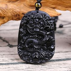 Chinese Dragon Obsidian Necklace - Courage and Endurance Black Obsidian Amulet Necklaces, Black Obsidian Amulet Necklace, Black Dragon Design Jewelry Gift, Black Jewelry With Dragon Design For Gift, Traditional Black Onyx Necklace, Black Carved Jewelry Gift, Black Carved Spiritual Necklace, Black Spiritual Jewelry With Dragon Design, Black Obsidian Necklace Gift