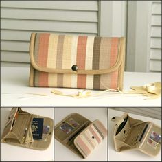 the purse is made out of fabric and has multiple compartments for cards, keys, and wallets