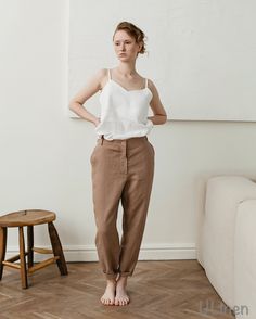 Introducing our Women's Linen Pants! Made for those easy-breezy days, these pants are a perfect blend of comfort and style. Crafted from lightweight linen fabric, they're ideal for everyday wear. MATERIAL: - High quality natural linen 100%  Listing INCLUDES: - 1 pc. Women's Linen pants  FEATURES: - Pockets - Cropped  - 100% Linen  - Stonewashed  - Soft  - OEKO TEX Certified  Model is wearing size S Color: Tobacco Model Measurements: Height: 5.7 ft. (175 cm) Bust: 35' (89 cm) Waist: 24.8' (63 cm) Spring Tapered Trousers, Summer Linen Straight Leg Jeans, Summer Straight-leg Linen Jeans, Summer Straight Leg Linen Jeans, Fitted Tapered Leg Summer Harem Pants, Fitted Tapered Leg Harem Pants For Summer, Fitted Summer Harem Pants With Tapered Leg, Casual Linen Straight Leg Jeans, Summer Linen Tapered Leg Jeans