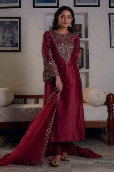 Maroon kurta with sequin, bead, cutdana, thread embroidery in floral pattern on yoke. Paired with churidar and dupatta. - Aza Fashions Raw Silk Unstitched Suit With Dabka For Reception, Chanderi Dabka Palazzo Set For Party, Silk Unstitched Suit With Dabka For Reception, Reception Salwar Kameez With Dabka In Tissue Silk, Eid Chanderi Salwar Kameez With Sequins, Elegant Chanderi Dupatta With Sequins, Reception Dabka Salwar Kameez In Tissue Silk, Reception Tissue Silk Salwar Kameez With Dabka, Elegant Festive Kurta With Sequins