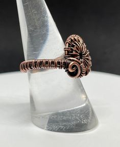 a close up of a ring on a table