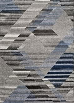 a gray and blue rug with an abstract design