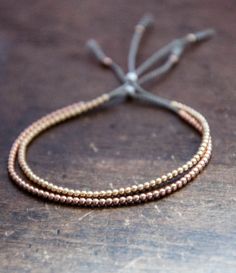 Solid 14k Rose Gold Beaded Friendship by VivienFrankDesigns Dainty Adjustable Gold Beaded Bracelets, Adjustable Yellow Gold Bracelet With Tiny Beads, Gold Beaded Minimalist Friendship Bracelets, Gold Minimalist Friendship Bracelets With Round Beads, Gold Braided Bracelet With Tiny Beads As Gift, Gold Braided Bracelets With Tiny Beads, Dainty Adjustable Bracelet With Gold Beads, Adjustable Braided Bracelet With Tiny Beads For Everyday, Gold Braided Bracelets With Tiny Beads For Friendship