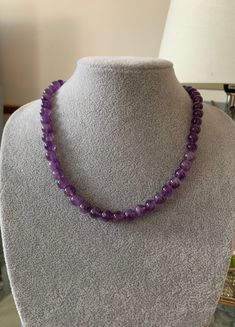 Amethyst Sterling Silver Necklace 18 ''. This is an Amethyst Sterling Silver beaded Necklace. The Amethyst Necklace has round shape beads with a Sterling Silver lobster clasp fastening. I can send this Amethyst Sterling Silver Necklace to you or to someone else anywhere in the world with your message. Dimensions  Necklace length 18 inches  Necklace width 8 mm An ideal gift for Birthday, Wedding bridesmaids gift, Graduation gift, Holiday jewellery, gift ideas , Anniversary gift and Mother's Day gift . I deliver to anywhere in the world. Contact  You can contact me anytime on my shop email with any questions, order and request. Spiritual Necklaces With Round Beads For Anniversary, Round Beads Necklaces With Natural Stones For Anniversary, Purple Amethyst Round Bead Necklaces, Purple Amethyst Round Beads Necklace, Purple Round Crystal Healing Necklace, Spiritual Amethyst Necklace For Anniversary, Purple Crystal Healing Necklace, Faceted Amethyst Necklace For Anniversary, Purple Faceted Round Bead Necklaces