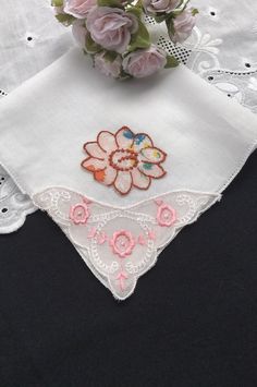 Delightful Embroidered and Appliquéd Pink and Red Floral Handkerchief, Hankerchief, Wedding Hankie, Hanky Condition: Excellent vintage condition. Size: 10-1/4 inches square Hem: Scalloped Materials : Cotton Age : 1950's to 1960's Colors: Pink, Red and White Motif : Embroidered Floral Wedding hankie Fabric note : Most of my hankies are nearly 70 years old and the fabric is quite delicate. Use with care. Some repurposed vintage hanky ideas : baby bonnets, doillies, change purses, collars & poc Elegant Pink Wedding Handkerchiefs, White Floral Embroidered Handkerchiefs For Gifts, Vintage Pink Handkerchiefs For Wedding, White Floral Embroidery Handkerchiefs For Gift, Embroidered Flower Handkerchiefs For Gifts, Flower-shaped Embroidered Handkerchiefs For Gifts, Flower Shaped Embroidered Handkerchiefs For Gift, Embroidered Flower Handkerchiefs As Gift, Traditional White Handkerchiefs With Floral Embroidery