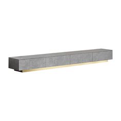 a large gray shelf with gold trim on the top and bottom, against a white background