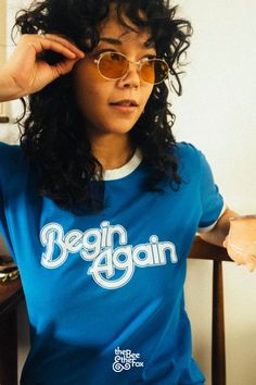 The Begin Again Vintage Graphic Tee is a must-have for anyone looking to express their individuality. This graphic tee blends seamlessly with your favorite retro shirt design, creating endless possibilities for a fashionable tshirt outfit. Elevate your graphic tees collection with this standout piece that resonates with a fresh start. 70s Outfits