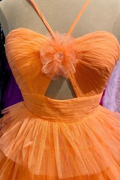 An Orange Halter Tulle Tiered Short Party Dress features a chic A-line silhouette with a Halter neck and Knotted front accentuated by a keyhole detail. The Tulle material adds a touch of elegance to the Tiered ruffles skirt, while the Above knee length and Zip-up back provide a convenient and stylish fit. SKU: 3483 Orange color Tulle material A-line silhouette Halter neck Knotted front with keyhole Tiered ruffles skirt Above knee length Zip-up back Built-in bra Ship in 7-10 business days Size: U Ruffles Skirt, One Shoulder Prom Dress, Mini Homecoming Dresses, Tulle Material, Tulle Homecoming Dress, Prom Girl Dresses, Layered Tulle Skirt, Birthday Party Outfits, Prom Dresses Two Piece