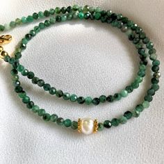 ★ Natural Stone (Emerald,) ★ Emerald Bead Chain (16-17 inches) ★ Adjustable chain (16-17 inches) ★ Gold Plated Closure Luxury Polished Bead Emerald Necklace, Green Faceted Beads Pearl Necklace For Gift, Emerald Necklace With Round Beads Chain For Gift, Emerald Necklace With Beaded Chain As A Gift, Emerald Necklace With Round Beaded Chain As Gift, Emerald Necklace With Round Beads Chain, Emerald Necklace With Round Beaded Chain, Single Strand Necklace For May Birthstone Gift, Emerald Beaded Necklace Single Strand As Gift