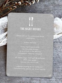 the night before wedding menu is displayed on a wooden table