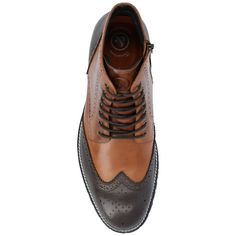 The Elijah boot by Thomas & Vine is crafted with authentic leather and wingtip details for an upscale look. A classic lace-up closure with brogue accents secures this well-made ankle-high style. The style is completed with a 6 mm Comfort Foam� footbed and a modern EVA outsole for a light and comfortable fit. Vintage Lace-up Boots With Brogue Detailing, Formal Wingtip Lace-up Boots For Winter, Winter Formal Lace-up Boots With Brogue Detailing, Classic Wingtip Lace-up Boots For Winter, Formal High-top Lace-up Boots With Brogue Detailing, Fall Wingtip Brogue Lace-up Boots, Fall Wingtip Lace-up Boots With Brogue Detailing, Winter Cap Toe Lace-up Boots With Brogue Detailing, Winter Lace-up Cap Toe Boots With Brogue Detailing