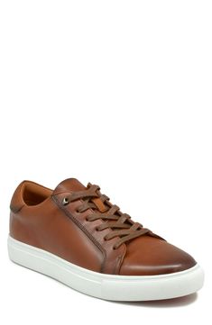 Clean-lined and crisp, this low-top sneaker is a forever-chic style that's as luxe as it is low-key.  Lace-up style Leather upper/synthetic lining/rubber sole Imported Brown Plain Toe Sneakers For Spring, Spring Brown Sneakers With Plain Toe, Brown Low-top Sneakers For Spring, Sneaker Men, Nordstrom Store, Anniversary Sale, Low Key, Up Styles, Mens Shoes Sneakers