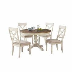 Bring a little of the cozy country farmhouse to your dining room or kitchen with the Prato 5-Piece Dining Table Set. Combining a weathered antique white and distressed oak finish with intricately carved legs, the set is elegant and rustic at once. The chairs and table are crafted to stand the test of time out of solid pine wood and solid rubberwood. The round table has a thick, graceful pedestal with an X-shaped base for stability. Its chairs offer country styled X-shaped backs. You can purchase Farmhouse Round Kitchen Table, Round Kitchen Table And Chairs, White Small Table, Farmhouse Style Dining Table, Round Dining Table Set, White Kitchen Table, Breakfast Table Setting, Mid Century Dining Table, Modern Dining Table Set