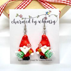 Christmas Tree Gnome Dangle Earrings are approximately 1 inch long.  Handmade of polymer clay.  Stainless Steel French wires earrings.  Earrings come on card.  Free gift box with assorted ribbon included. Adjustable Earrings As A Christmas Gift, Adjustable Earrings For Christmas Gift, Whimsical Polymer Clay Earrings For Gift, Whimsical Polymer Clay Earrings As Gift, Clay Gnome Earrings, Polymer Clay Gnome Earrings, Christmas Gnome Earrings, Beaded Gnome Earrings, Christmas Gonk Earrings