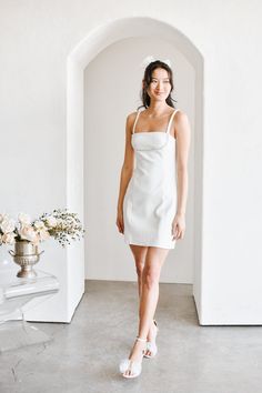 Get ready to say "I do" in style with our Colette Mini Dress with Pearl Detail! This classic white sheath mini dress features delicate pearl beaded detailing along the bust, while the adjustable shoulder straps ensure a perfect fit. Made from stretchy mid-weight fabric, it's a perfect little white dress for your bachelorette or engagement party. Don't miss out on this must-have for brides-to-be! Elegant Mini Dress With Adjustable Straps, White Mini Dress With Sweetheart Neckline And Built-in Bra, Elegant Fitted Mini Dress With Adjustable Straps, Elegant Bodycon Mini Dress With Adjustable Straps, Elegant Bodycon Dress With Straight Neckline For Brunch, White Mini Slip Dress With Adjustable Straps, Elegant Mini Dress With Adjustable Straps And Fitted Bodice, White Mini Dress With Fitted Bodice And Straight Neckline, Elegant Mini Bodycon Dress With Adjustable Straps