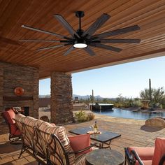 a patio with furniture and a ceiling fan