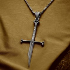 Silver Fantasy Elven Sword, Broken Blade Necklace Birthday Gift For Him Christmas Present Medieval Jewelry Mens, Womens Pendant ✦ Jewelry Details ✦ * Pendant Length: 2.66 Inches / 6.7 cm / 67 mm * Pendant Width: 1.31 Inches / 3.4 Cm / 34 mm * Weight: 7.5-8.5 grams * Finish: Oxidized * Material: 925 Sterling Silver * Stamp: 925 * Chain Thickness: 1.40mm / 0.06 Inches / 0.14 cm * Chain Weight: 18 Inches, 4,55 Grams 20 Inches, 5,10 Grams 22 Inches,  5,60 Grams 24 Inches, 6,00 Grams 26 Inches, 6,75 Blade Necklace, Broken Blade, Jewellery For Men, Cheap Necklaces, Jewelry Mens, Jewelry Details, Chocker Necklace, Medieval Jewelry, Boho Choker