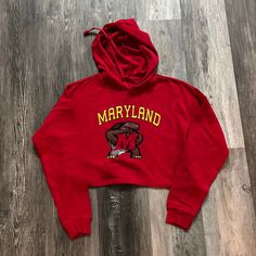 New With Tags. Red. Size Small. Trendy Red Cotton Sweatshirt, Hooded Tops For Game Day In Winter, Red Cotton Hoodie For Fall, Hooded Winter Tops For Game Day, Red Fall Sweatshirt With Adjustable Hood, Red Cotton Hoodie With Double-lined Hood, Red Cotton Sweatshirt With Double-lined Hood, Red Cotton Hoodie With Letter Print, Collegiate Red Hoodie Top