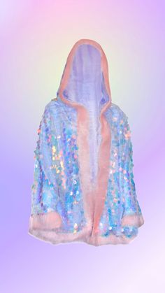 Meet with Hologram Mermaid Festival Jackets and join the happiness carney with its holographic crystal fabric, shinny hoodie and faux fur details. This luxurious piece is perfect for chilly weather, cocktail nights and all festivals. ♥ Standart Sizes (S-M & L-XL) ♥ Unisex and Handmade ♥ Oversize Hoodie ♥ Mermaid Hologram Fabric ♥ Glitter Lining (Best for chilly nights ! ) ♥ Beautiful drape and movement ♥ Length : 65cm ♥ Specialist dry cleaning only Iridescent Outerwear For Fall Party, Fitted Iridescent Outerwear For Winter, Winter Festival Sequined Outerwear, Blue Embellished Party Outerwear, Party Blue Sequined Outerwear, Blue Sequined Outerwear For Party, Festival Jackets, Mermaid Festival, Crystal Fabric