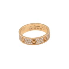 Cartier Love Wedding Band, Diamond Paved 18K Rose Gold ring set with 88 brilliant-cut diamonds totaling 0.31 carats Total Diamond Weight: 0.31ct Ring Size: US 6.75 (54 MM) Ref. CRB4085854 SKU: CAR01375 Please don't hesitate to contact us for any additional details. Luxury Cartier Rose Gold Diamond Ring, Cartier Diamond Ring With Pave Setting For Wedding, Cartier Diamond Promise Jewelry, Cartier Diamond Jewelry For Promise, Cartier Love Wedding Band, Wedding Band Diamond, Rose Gold Ring Set, Cartier Love Ring, Pave Diamond Ring