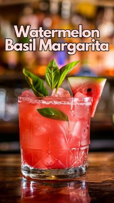 the watermelon basil margarita is garnished with mint