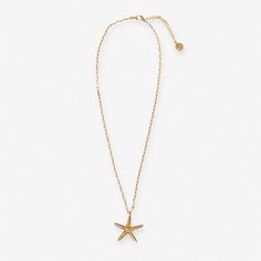 Bring a touch of the Amalfi coast to your ensemble with the Sienna Starfish Pendant Necklace in Brass. Crafted from 99.95% Brass and 0.05% Gold, this necklace features a charming starfish design, adding a touch of seaside charm to your look. Sienna is the ideal accessory for those who want to carry a piece of Amalfi with them wherever they go. --DETAILS-- pendant: 1.25" L, 1.05" W; Chain 16" plus 2" extender Handmade by skilled artisans in India Hypoallergenic nickel + lead-free brass hardware These accessories are made by human hands. A slight variation in size and color is considered part of the beauty of these one-of-a-kind pieces. To extend the life of your accessories, store them in a dry place while swimming, showering, or working out. Original design copyright INK+ALLOY© --END OF DE Starfish Shell Necklace As A Gift, Star Charm Necklace For Beach, Beach Star Charm Necklace, Star Charm Necklaces For Beach, Elegant Starfish Charm Star Necklace, Elegant Starfish Charm Necklace, Elegant Star-shaped Necklace With Starfish Charm, Elegant Starfish Charm Necklace For Beach, Beach Starfish Charm Necklace